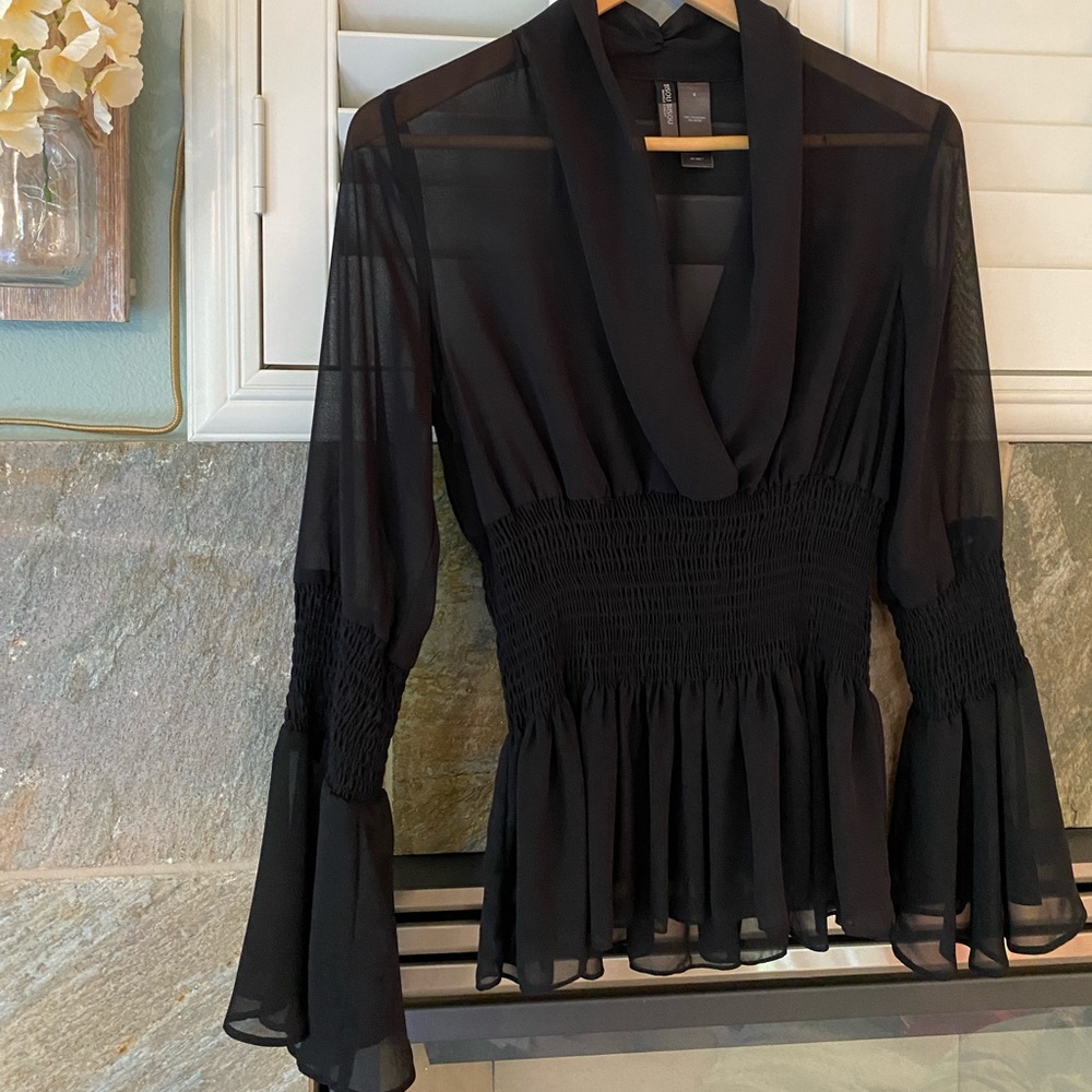 Black sheer pretty blouse. Like new.
